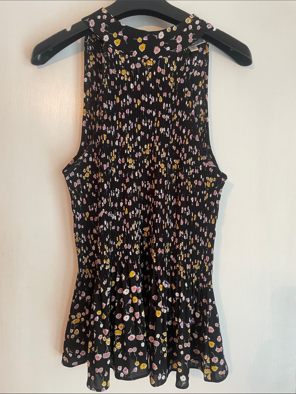 Pleione Black Sleeveless Smocked Floral Peplum Top